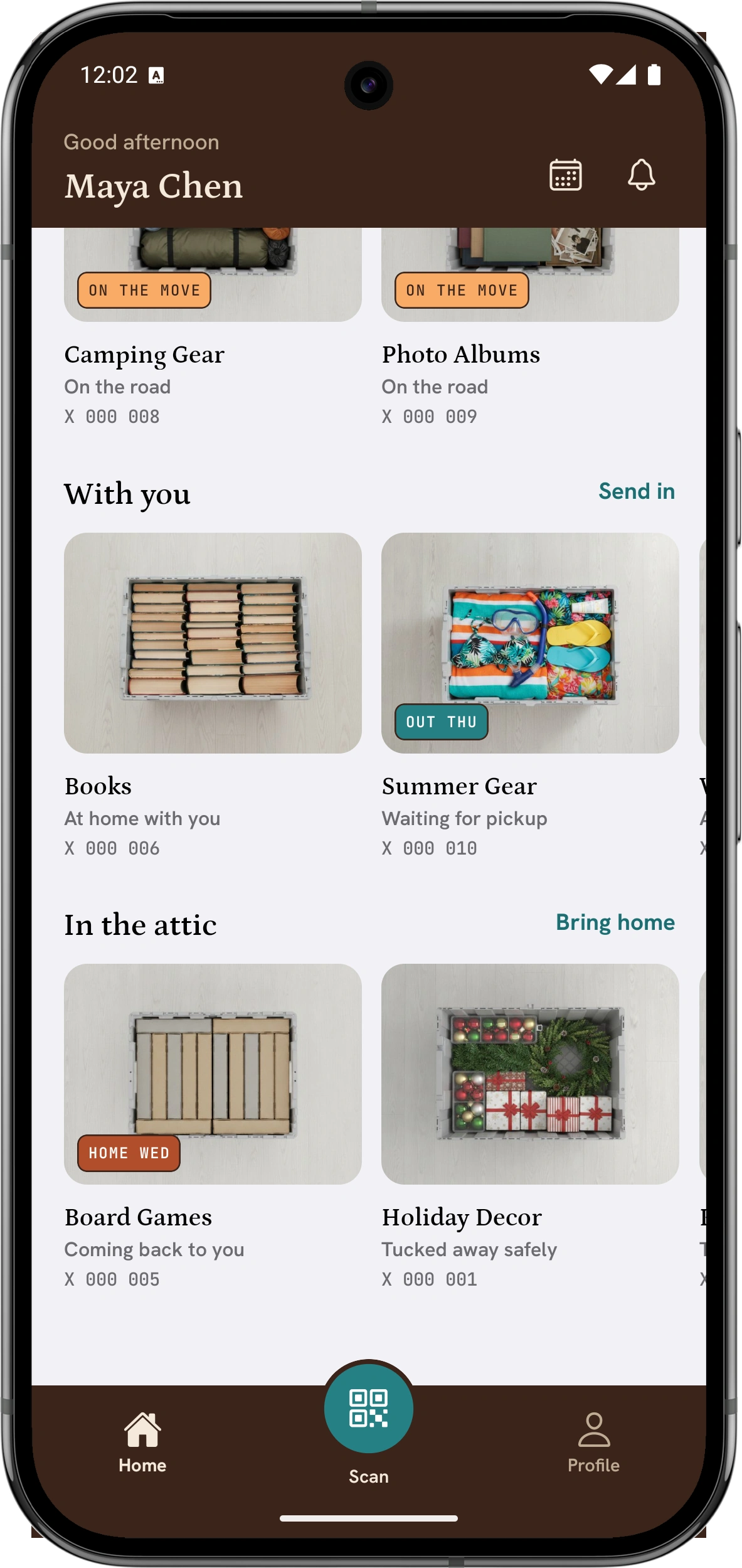 The Attic app home screen, showing crates on the move and crates at home as rows of cover photos
